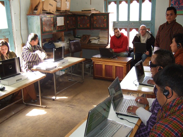 Photo: Pema teaching on in service course 2009, Bjørn and Trond in the background.